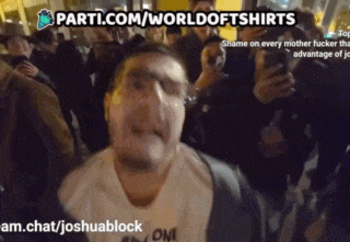 a man stands in front of a crowd with the words parti.com/worldofshirts on the top