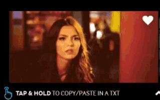 a screen shot of a woman with the words tap and hold to copy / paste in a xt
