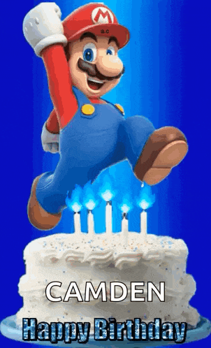 a happy birthday card with mario jumping over a cake