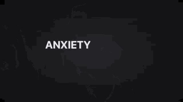 a black and white photo of a man with the word anxiety written above him