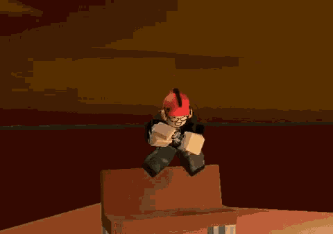 a cartoon character wearing a red hat and glasses is sitting on a box .