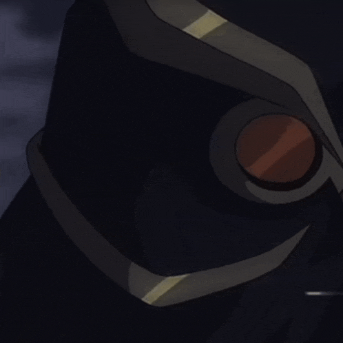 a close up of a cartoon owl 's eyes with a dark background