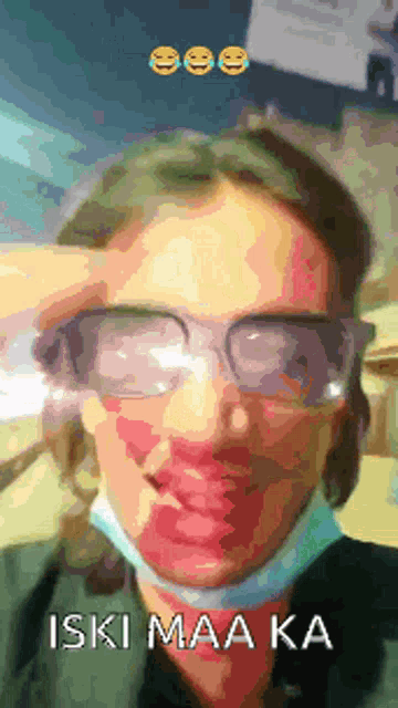 a woman wearing glasses and a mask with the words " iski maa ka " on the bottom