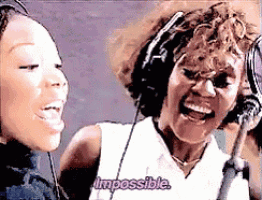 two women singing in front of a microphone with the word impossible written on the bottom