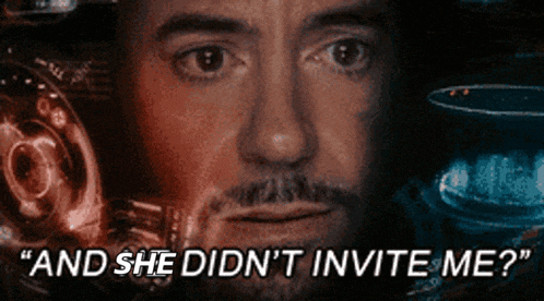 a close up of a man 's face with the words `` and she did n't invite me ''