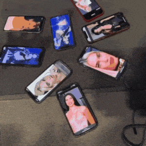 a bunch of cell phones with pictures of women on the screens