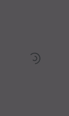 a gray background with a black circle in the middle .