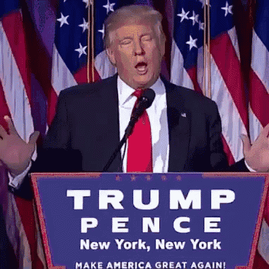 donald trump is giving a speech at a podium that says " trump pence new york new york make america great again "