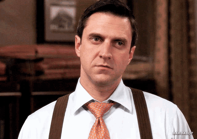 a man wearing a white shirt and brown suspenders with barbabot written on the bottom