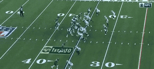 a group of football players on a field with a nfl logo on the bottom right