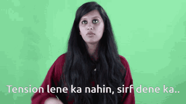 a woman with long black hair says tension lene ka nahin sirf dene ka ..