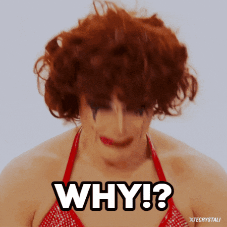 a drag queen with red hair says why !