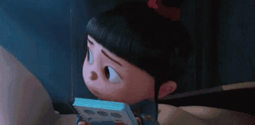 a cartoon girl is yawning while holding a book in her hands .
