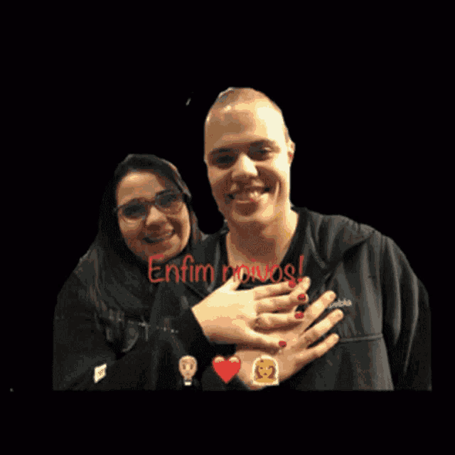 a man and a woman are posing for a picture with the words enfim noivos