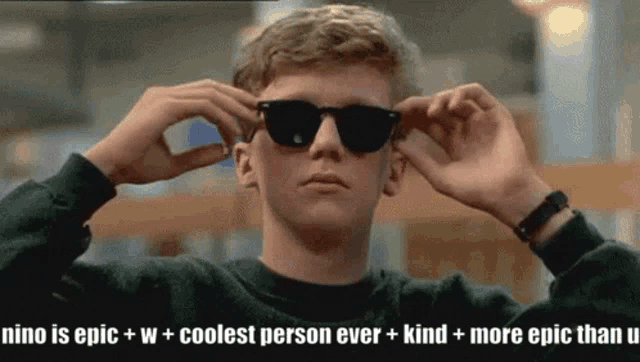 a man wearing sunglasses with the caption nino is epic + w + coolest person ever + kind + more epic than u.