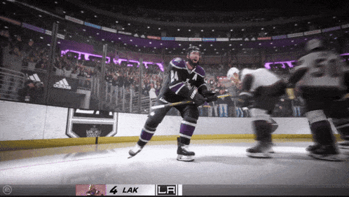 a hockey game is being played with the score 4 lak lr
