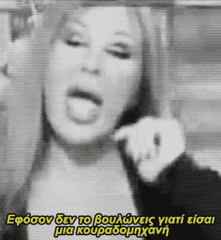 a black and white photo of a woman sticking her tongue out with a caption in yellow