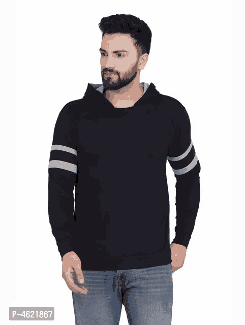 a man wearing a black hoodie with gray stripes on the sleeves