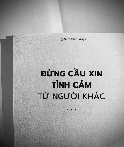 a black and white photo of a book with a quote on it
