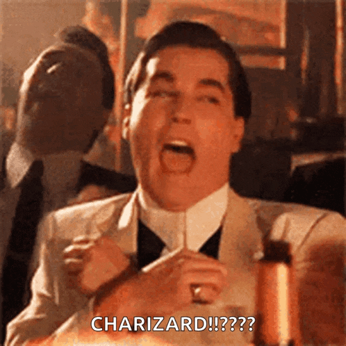 a man in a suit and tie is making a funny face and saying charizard