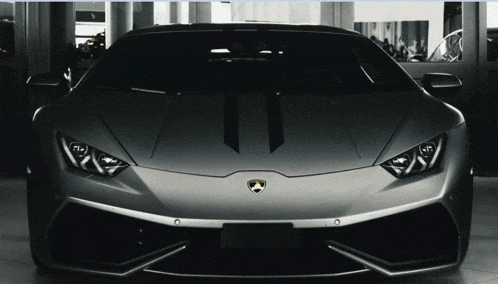 a black car with a lamborghini logo on it