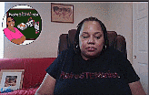a woman is sitting in a chair with a picture of a woman behind her
