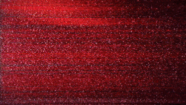a red background with a lot of small dots
