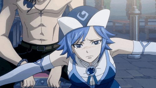 a girl with blue hair and a white hat with a g on it