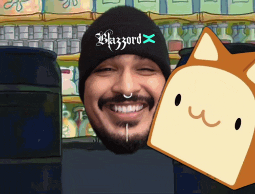 a man wearing a beanie that says blazzard x