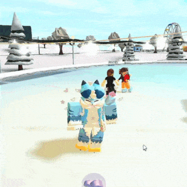 a person in a blue and pink outfit is standing in a snowy area .