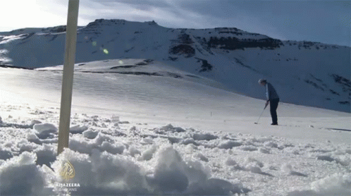 Putting In The Snow GIF - Putter Snow Golf GIFs