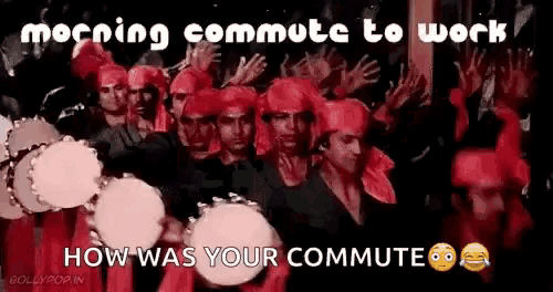 a group of people wearing red turbans are playing drums and singing .