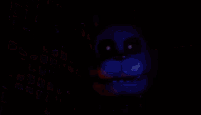 a blurry image of a person behind a grid