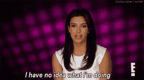 a woman is standing in front of a purple background and saying `` i have no idea what i 'm doing ''