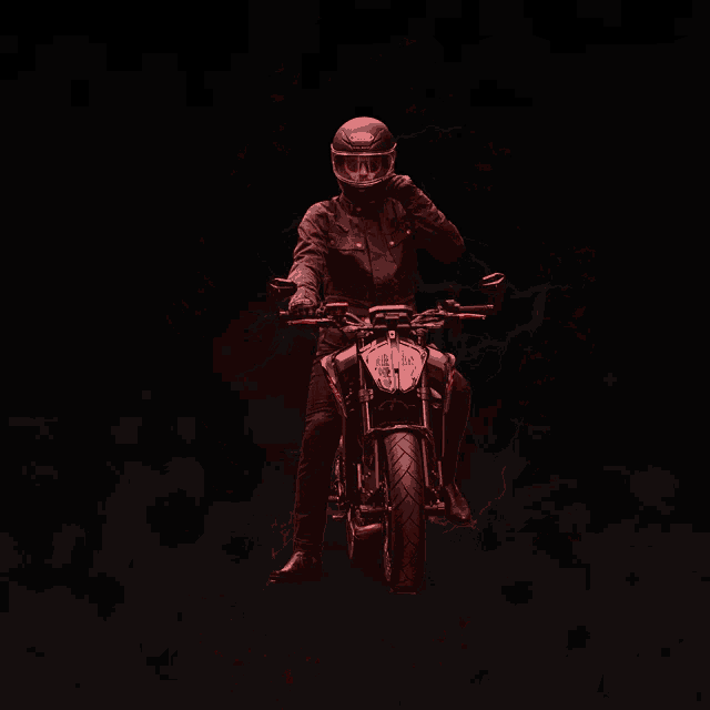 a man wearing a helmet is riding a motorcycle with red lightning behind him
