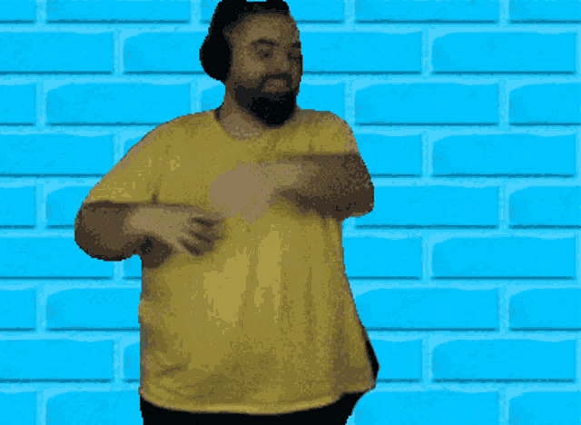 a pixelated image of a man wearing a yellow shirt