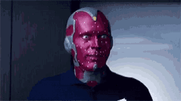 a man with a red mask on his face .