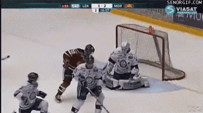 a hockey game is being played on a television screen