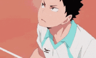 a close up of a person in a volleyball uniform holding a racket .