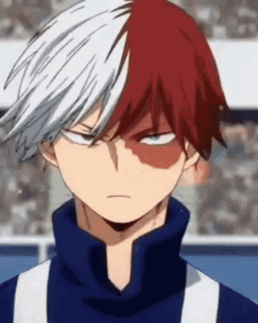 a close up of a person with red and white hair and a blue shirt .