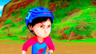 a boy wearing a blue helmet and a red shirt is riding a bike .