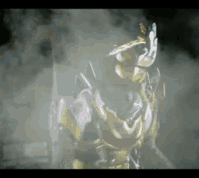 a close up of a statue in a foggy room