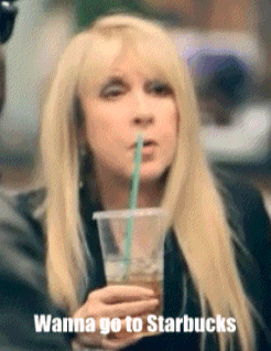 a woman drinking through a straw with the words wanna go to starbucks written below her