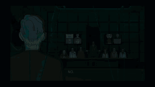 a man in a suit stands in front of a group of people sitting around a table and says no