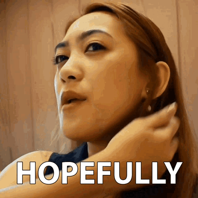 a close up of a woman 's face with the words hopefully written above her