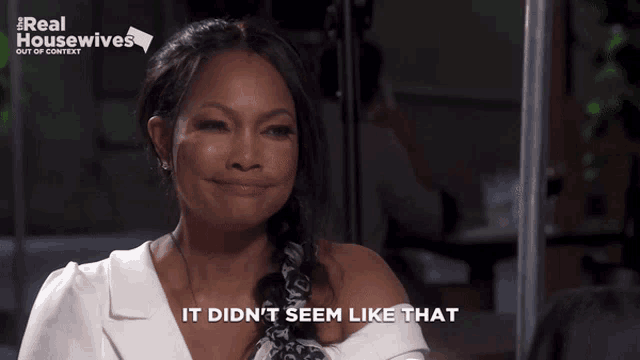 a woman says it did n't seem like that in front of a real housewives sign