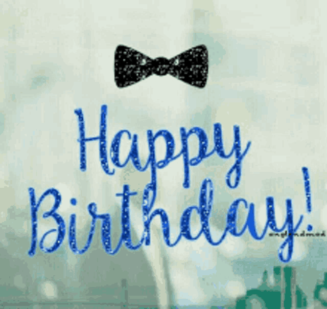 a blue happy birthday sign with a bow tie