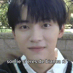 a close up of a person 's face with the words sonrie si eres de bianca 3 written below it