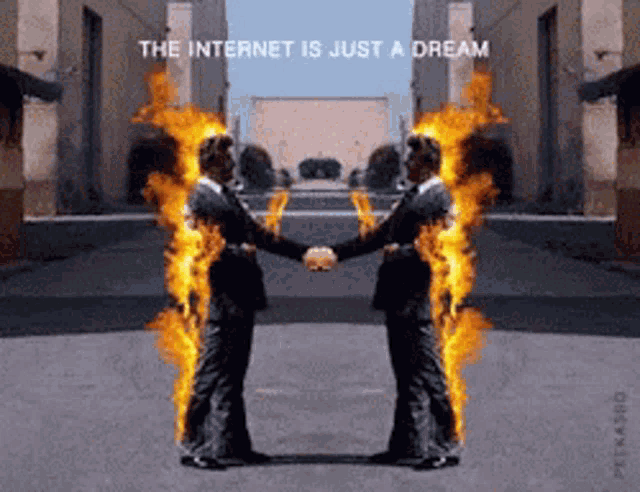 two men shaking hands with flames coming out of their bodies and the words " the internet is just a dream " above them