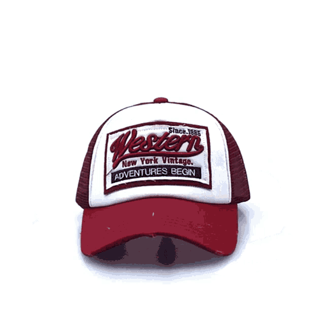 the back of a maroon trucker hat with a white embroidered logo